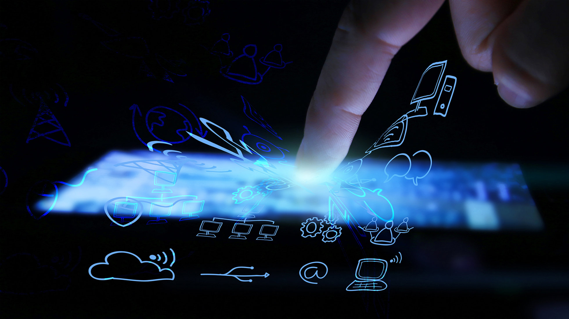 Fingertip touching a glowing digital interface